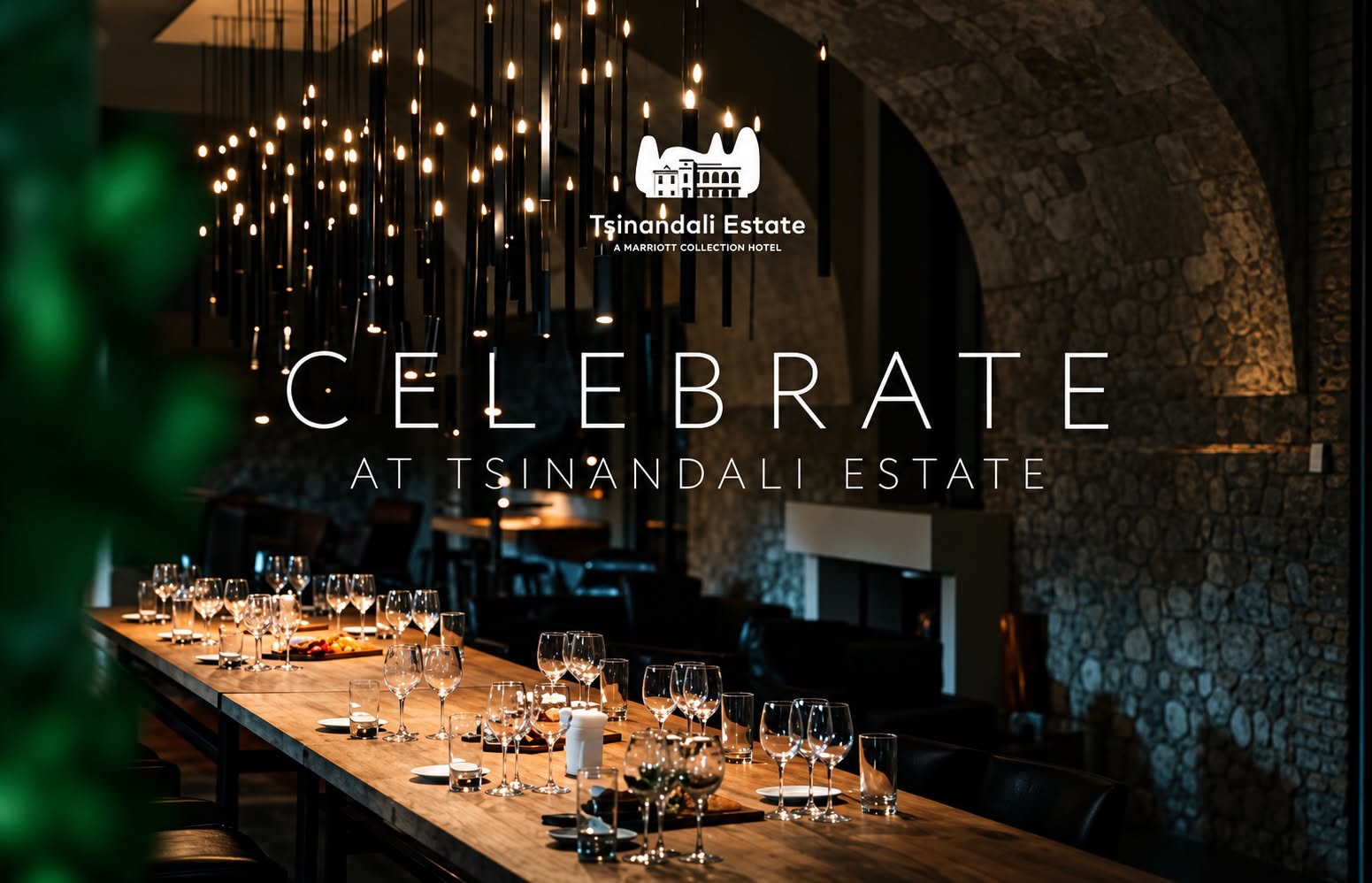 “Celebrate at Tsinandali Estate” campaign visual: a long dinner table set in a candlelit stone hall